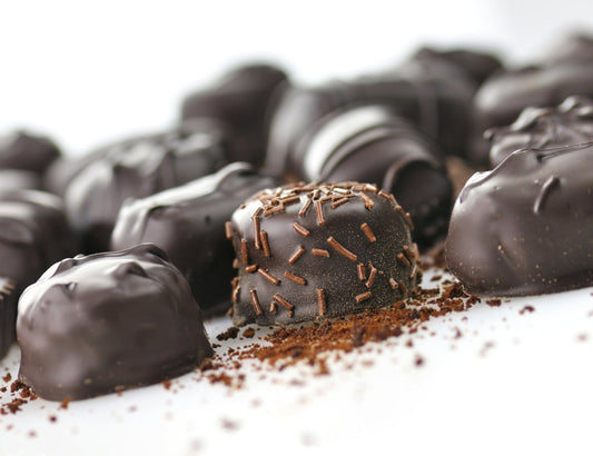 A collection of chocolate truffles to illustrate The Harry & David Story First Oregon — and Then the World